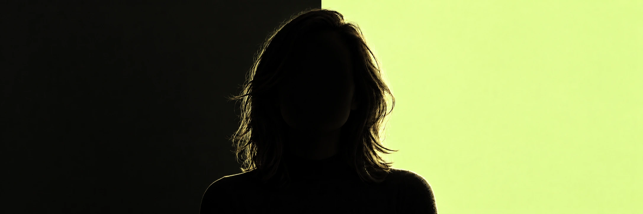 An anonymous dark silhouette against a charcoal and TenTwo lime background